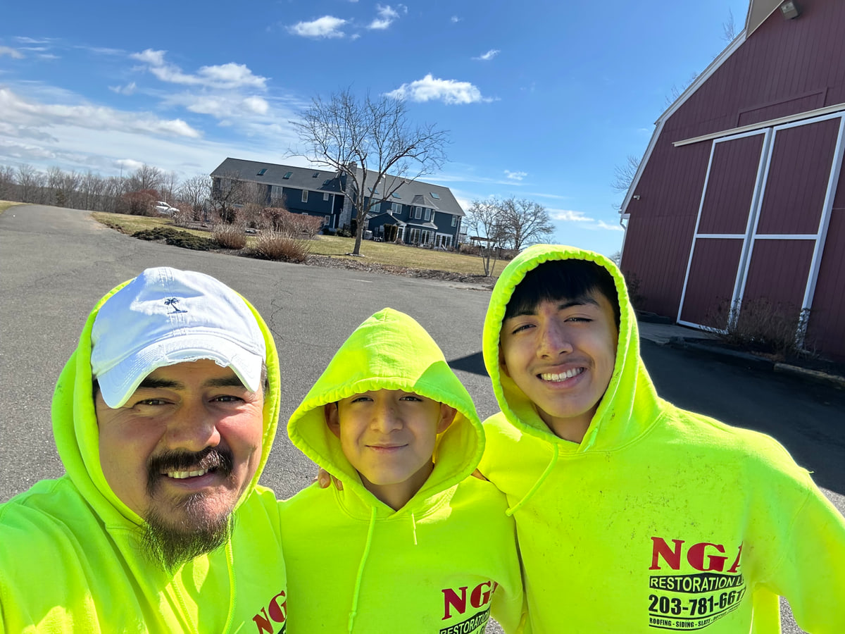 Nerio Tello with his sons — the family behind NGA Restoration