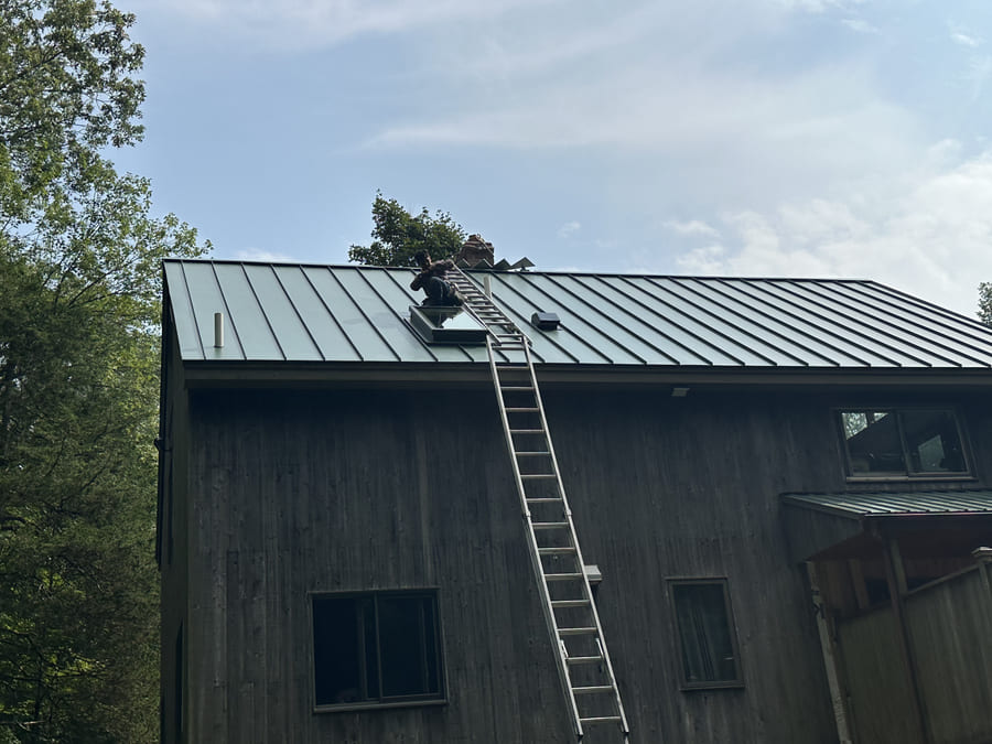 Forest green standing seam metal roof — Durham, CT