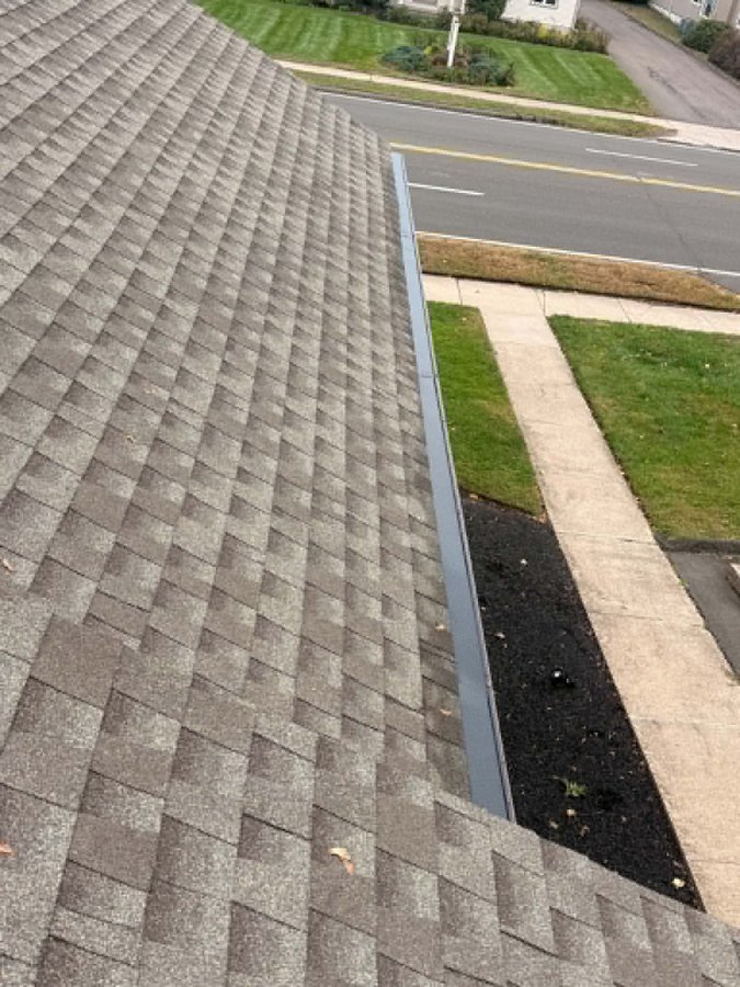 Installed gutter guards viewed from the roof - Hamden, CT