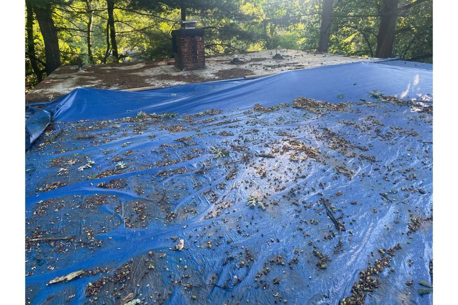 Before: existing roof under a protective tarp - Norwalk, CT
