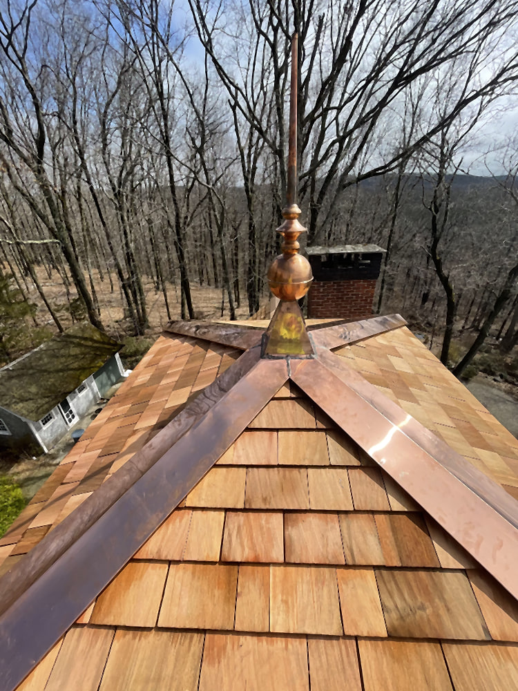Custom copper turret roof with finial